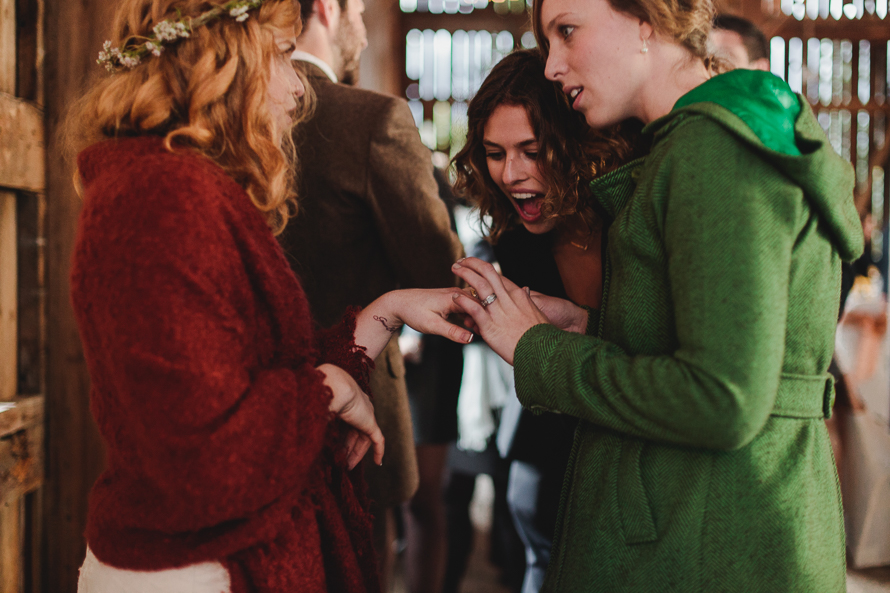 Candid moment of the bride and her guests at Polmenna Barn in Campbellford, Ontario