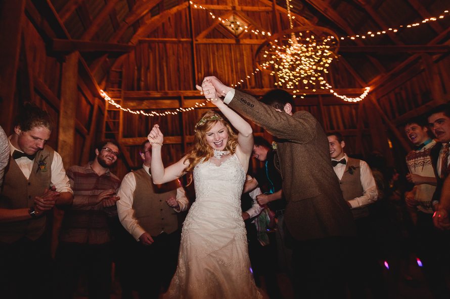 Candid moments from Campbellford wedding photographer at Polmenna Barn wedding reception in Campbellford, Ontario