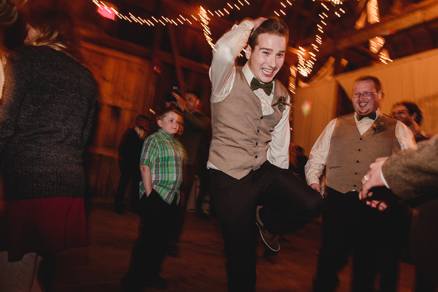 Guests dancing at Polmenna Barn wedding reception in Campbellford, Ontario