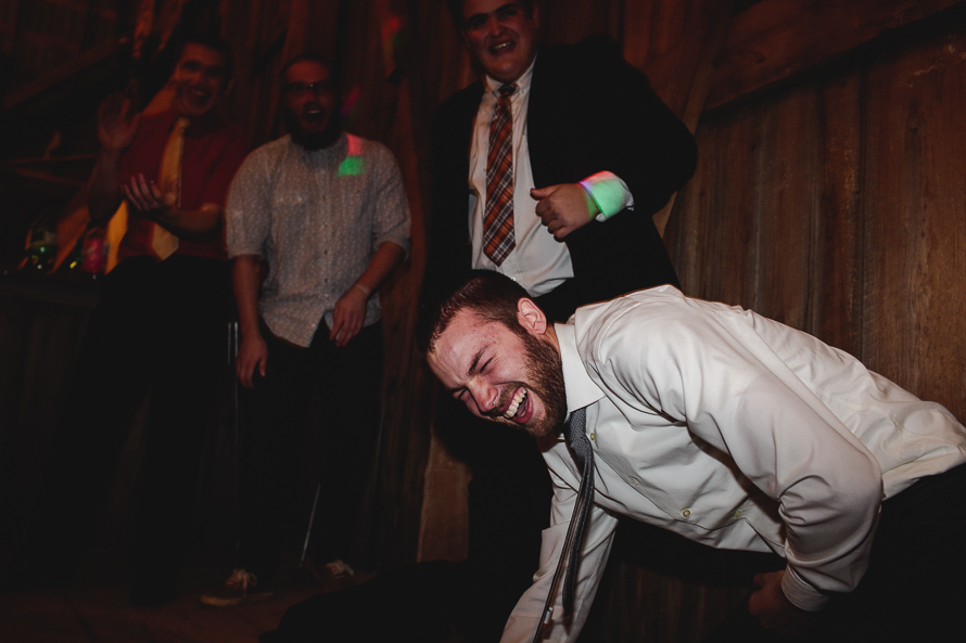 Candid moments by Peterborough Wedding photographer at Polmenna Barn wedding reception in Campbellford, Ontario